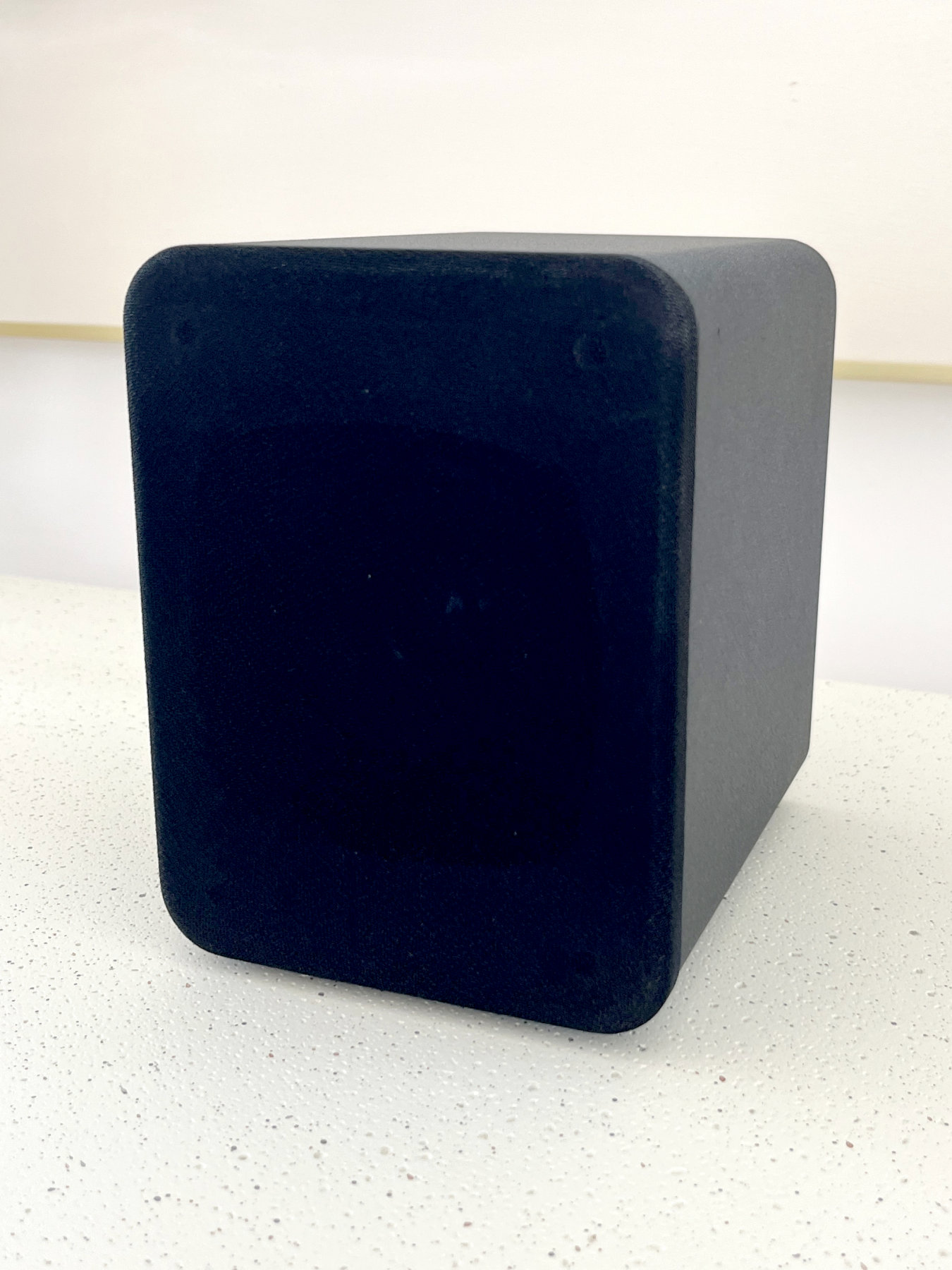 HouseWaves-One front view — matte black mesh grille