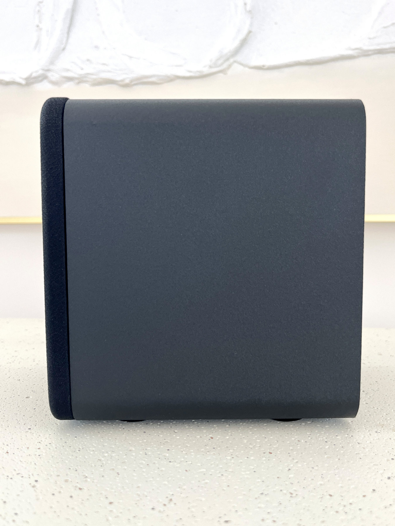 HouseWaves-One side view — compact cabinet with rounded edges